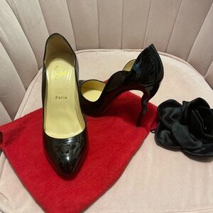 Cristian Louboutin wavy heel pump
